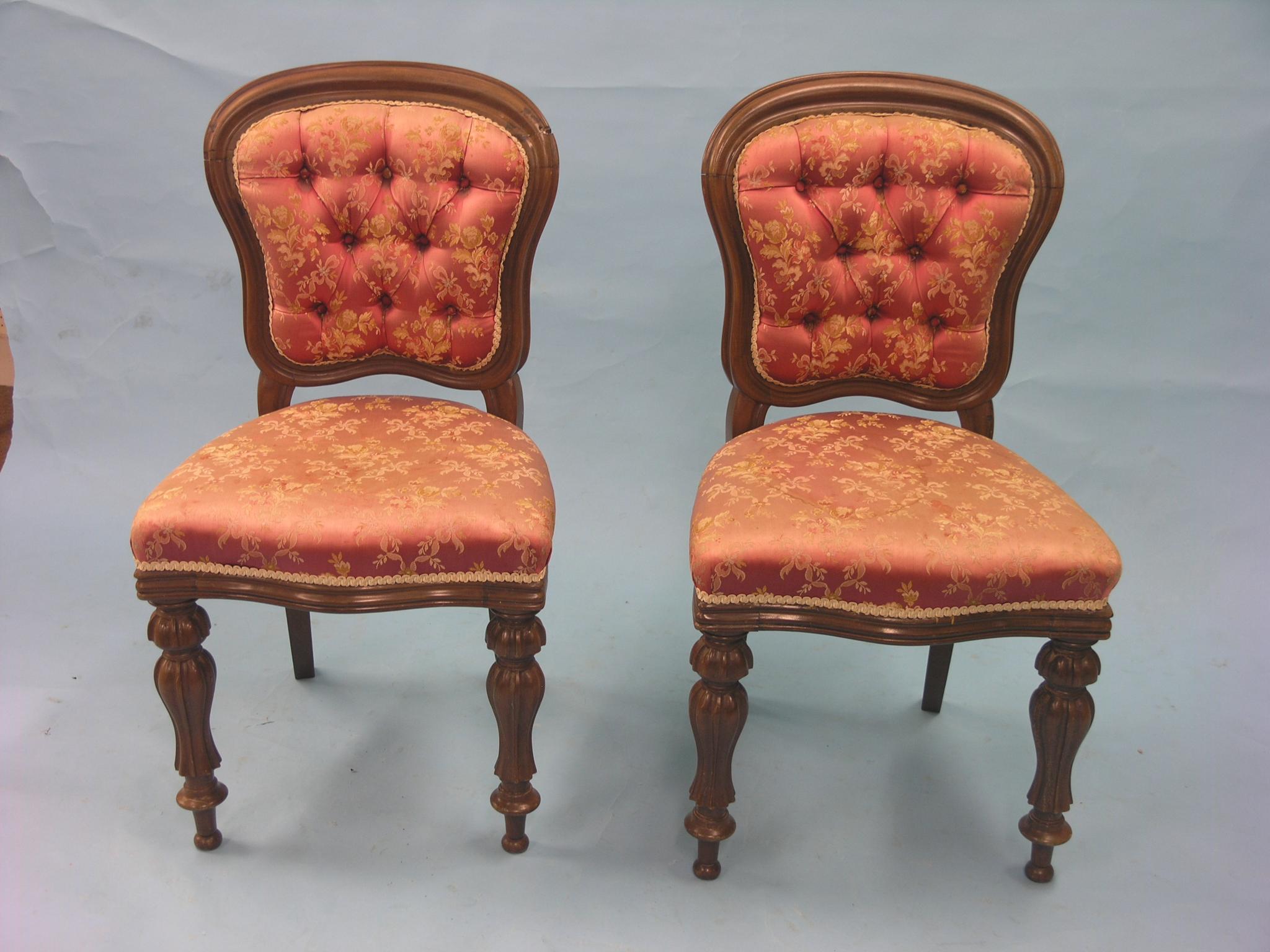 Appraisal: A pair of Victorian mahogany balloon-back dining chairs on front