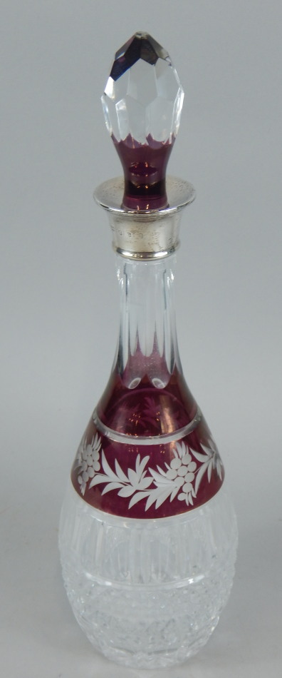 Appraisal: A modern ruby flash cut glass decanter and stopper with