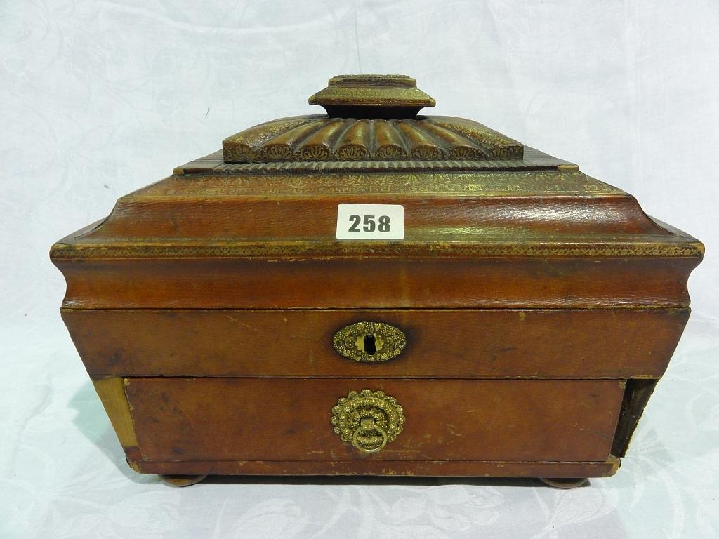 Appraisal: A Regency work box of sarcophagus shape covered in red