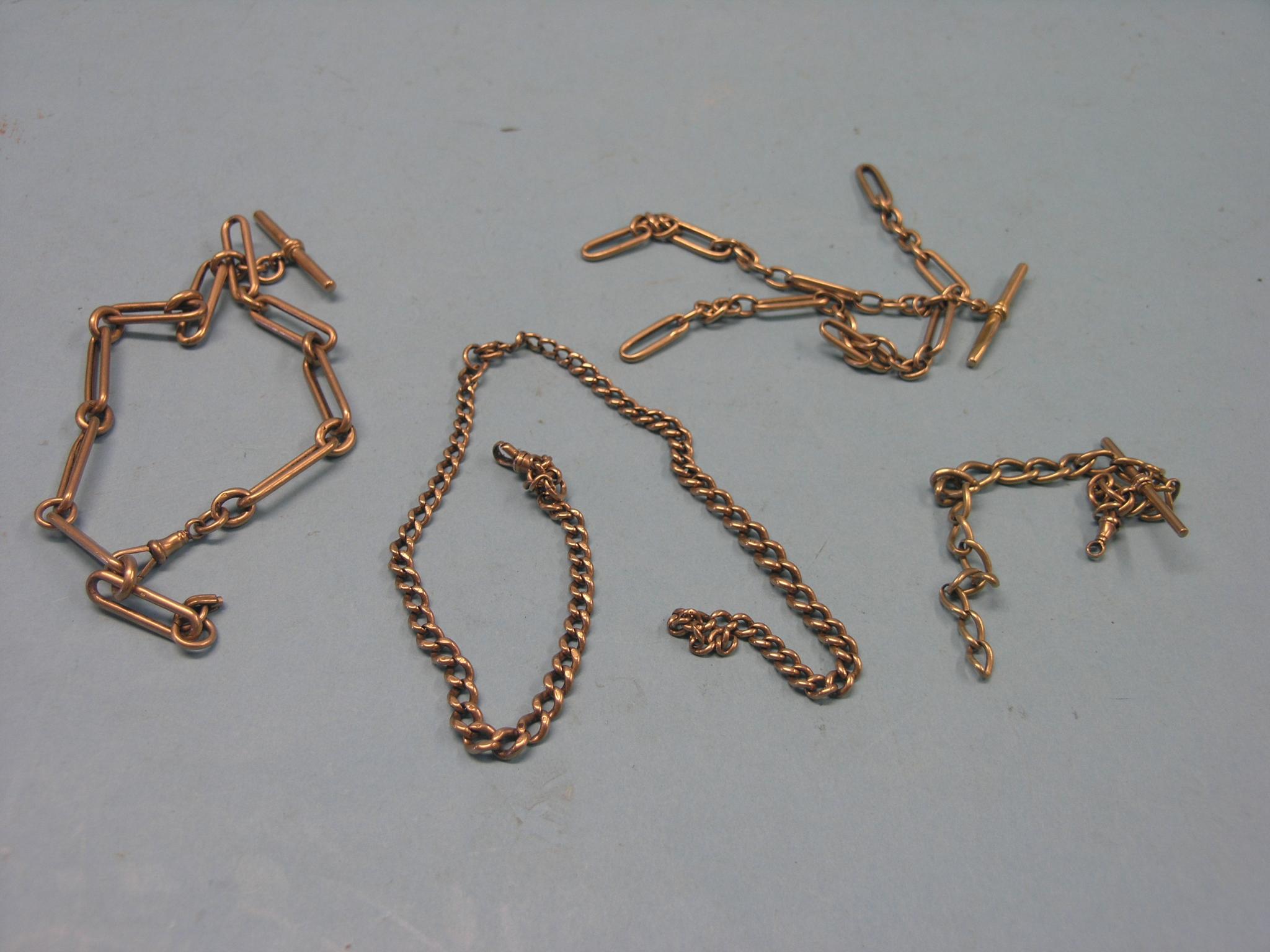 Appraisal: Three ct gold watch chains grams total and an unmarked