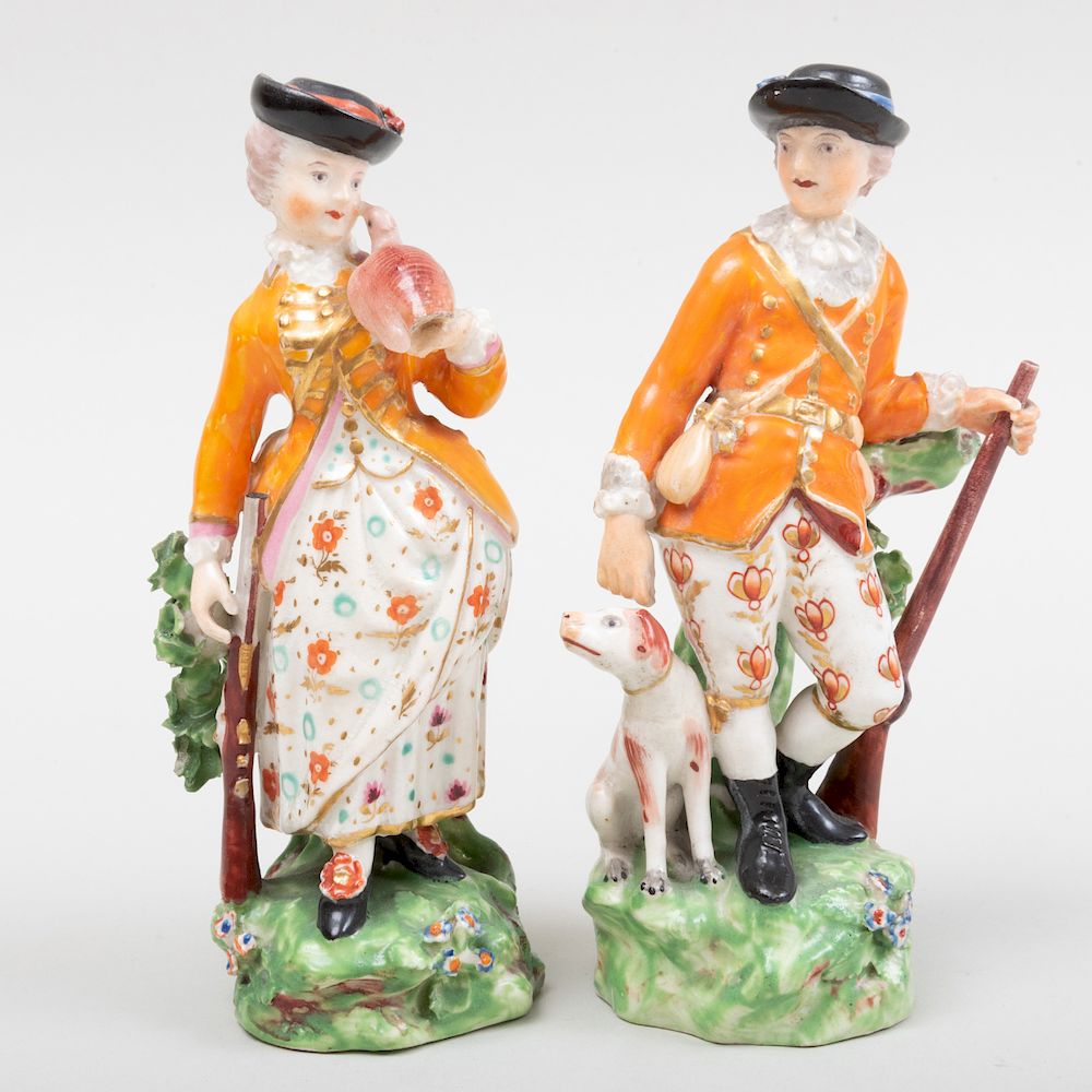 Appraisal: Pair of Derby Porcelain Figures of a Hunter and Companion