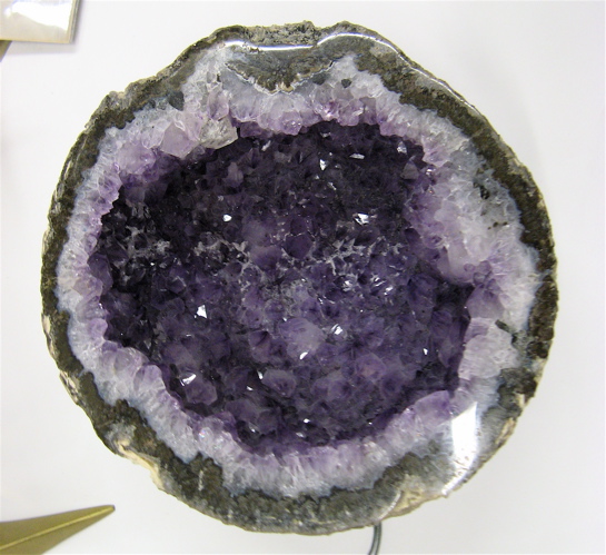 Appraisal: PAIR AMETHYST CRYSTAL NATURAL GEODES the purple hues shading to