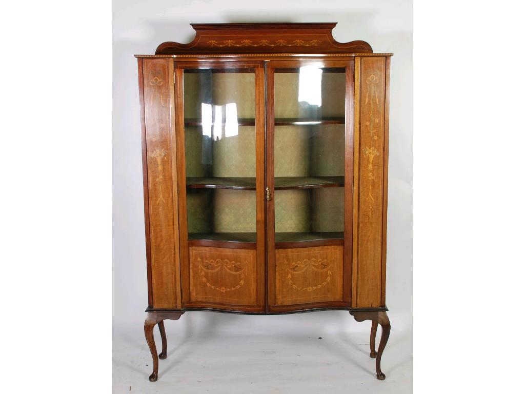 Appraisal: EDWARDIAN MAHOGANY AND MARQUETRY INLAID SERPENTINE FRONTED DISPLAY CABINET the