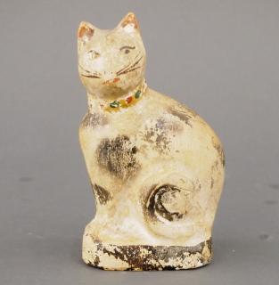 Appraisal: Chalkware cat A late th century chalkware cat with original