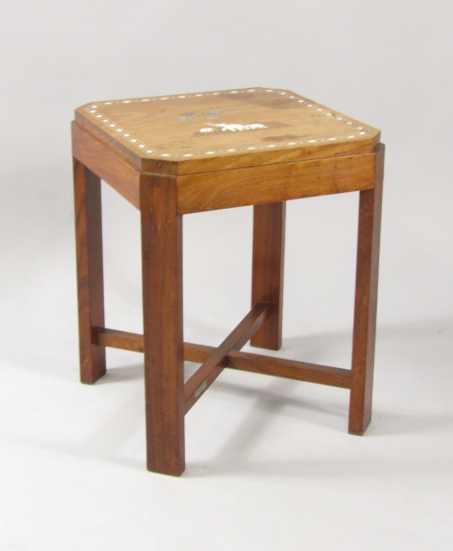 Appraisal: A 's Indian teak occasional table inlaid with wood ivory