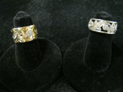 Appraisal: Two diamond band ringsOne open foliate form set with petite