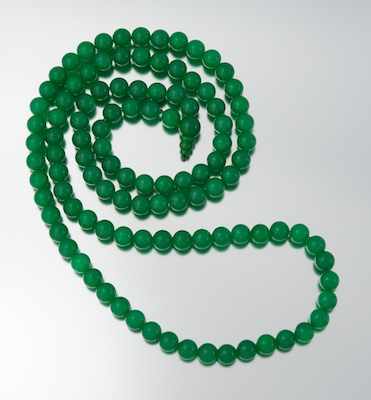 Appraisal: A Long Jadeite Bead Necklace Individually strung mm jadeite beads