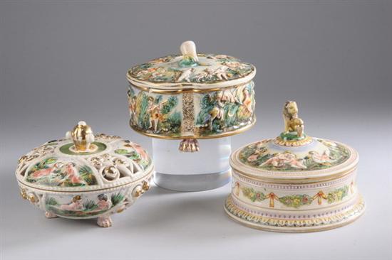 Appraisal: THREE CAPO DI MONTE CERAMIC BOXES th century One footed