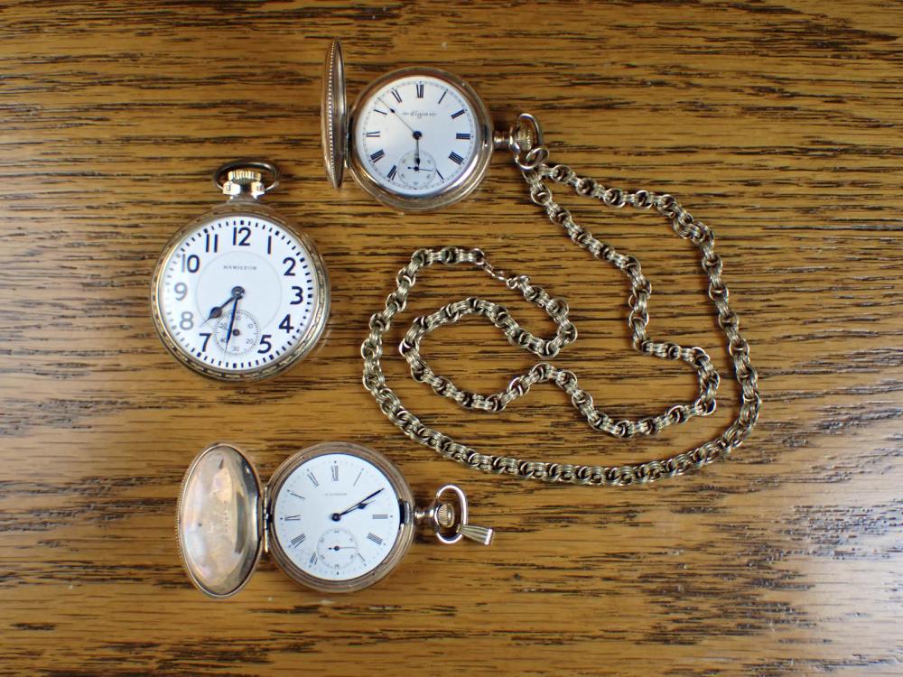 Appraisal: THREE POCKET WATCHES Hamilton model grade open face RR grade