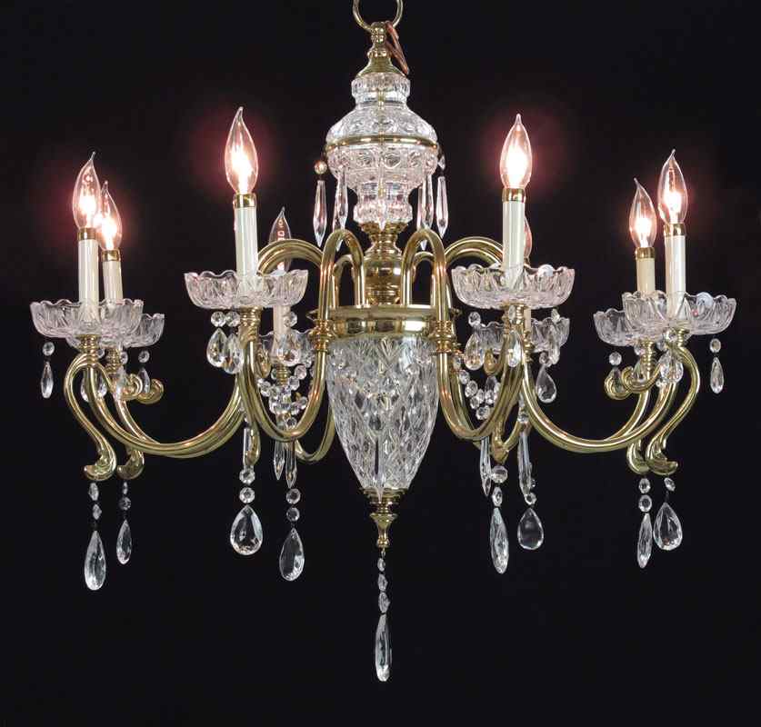 Appraisal: CZECH CRYSTAL AND BRASS CHANDELIER Elegant light chandelier by Lustrove