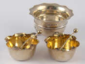 Appraisal: A pair of Victorian silver salts with matching spoons Birmingham