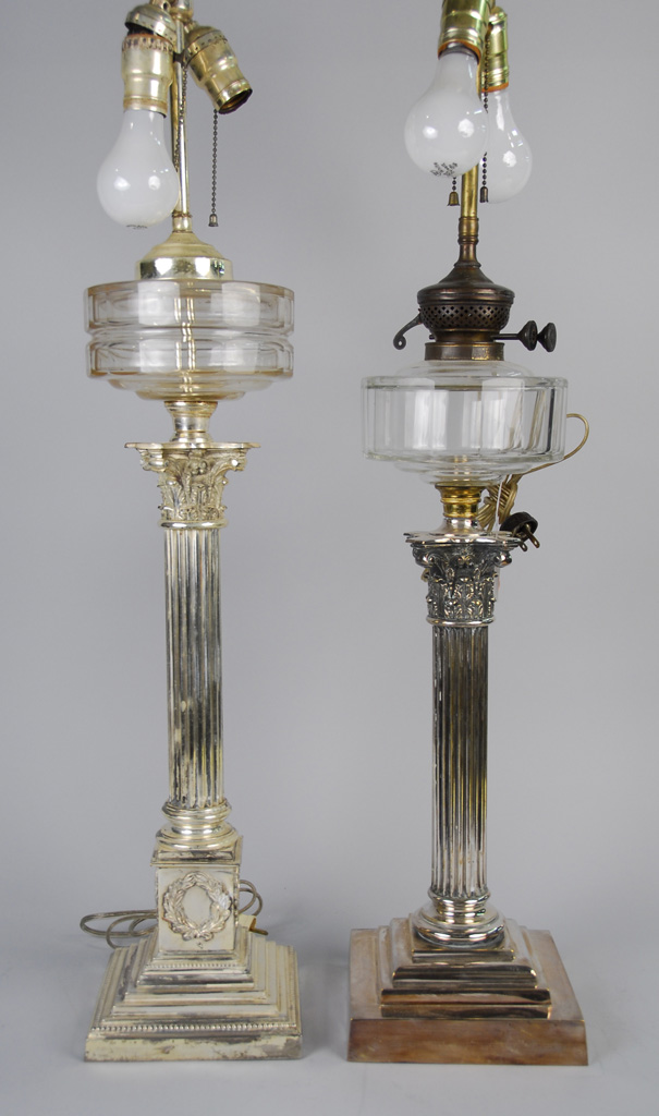 Appraisal: TWO SIMILAR SILVER PLATED CORINTHIAN COLUMN LAMPS height of taller