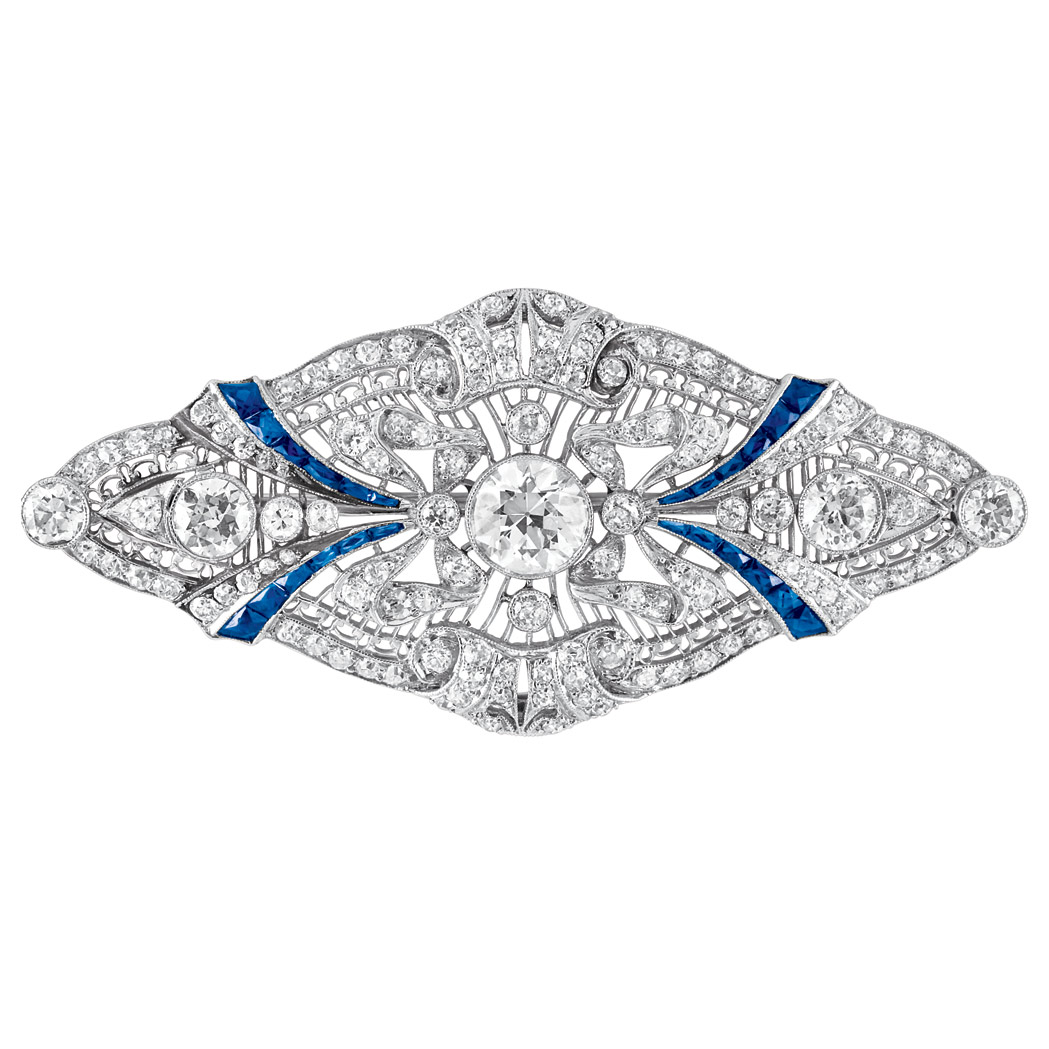 Appraisal: Edwardian Platinum Diamond and Sapphire Brooch The pierced fancy-shaped brooch