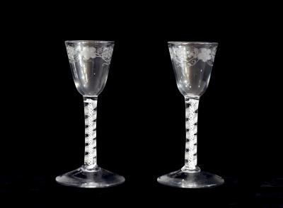 Appraisal: A pair of th Century engraved air twist wine glasses