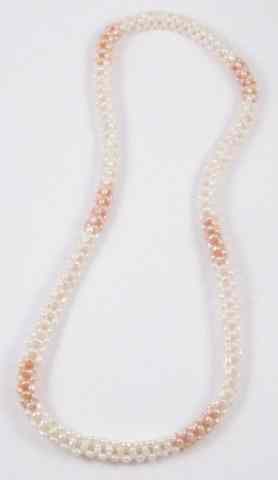 Appraisal: PINK AND WHITE PEARL NECKLACE '' in length and strung