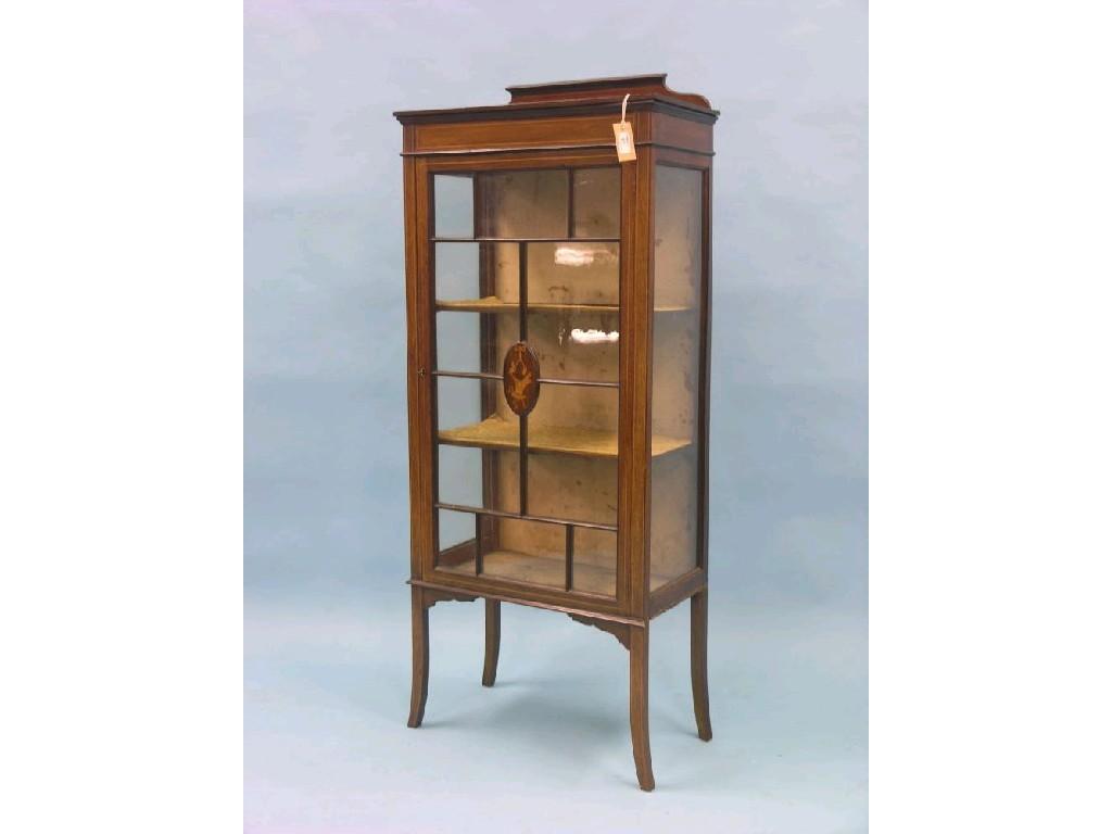 Appraisal: An Edwardian inlaid mahogany display cabinet single astragal-glazed door enclosing