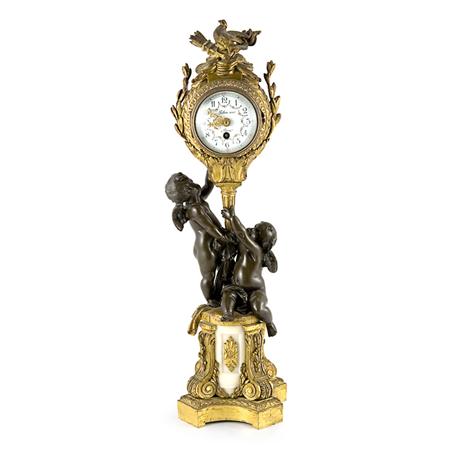 Appraisal: Louis XVI Style Gilt and Patinated-Bronze Mantel Clock Estimate -