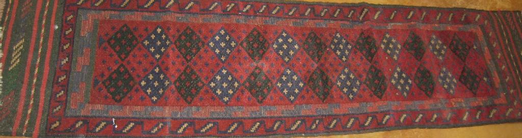 Appraisal: A Persian Sumak Runner with diamond design ft in x