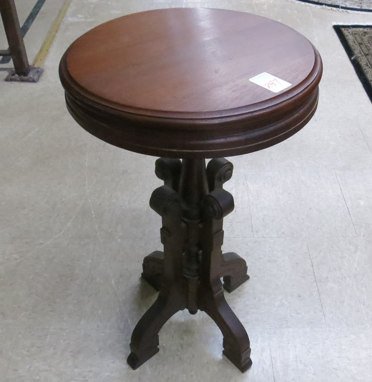 Appraisal: A VICTORIAN WALNUT ROUND-TOP LAMP STAND American last quarter of