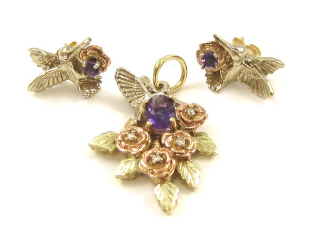 Appraisal: AMETHYST PENDANT AND EARRING SET with k yellow rose and