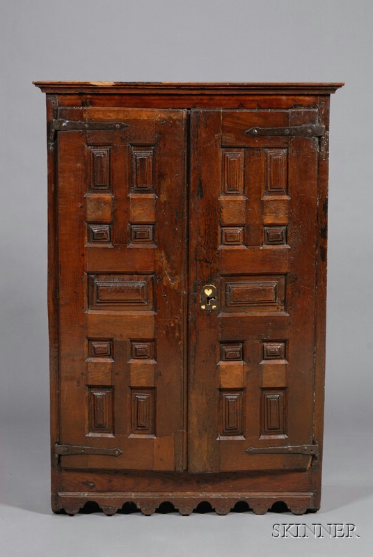 Appraisal: Spanish Provincial Baroque Oak Two-door Cabinet with antique elements rectangular