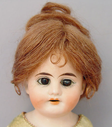 Appraisal: HEUBACH KOPPELSDORF GERMAN BISQUE HEAD DOLL Bisque head with stationary