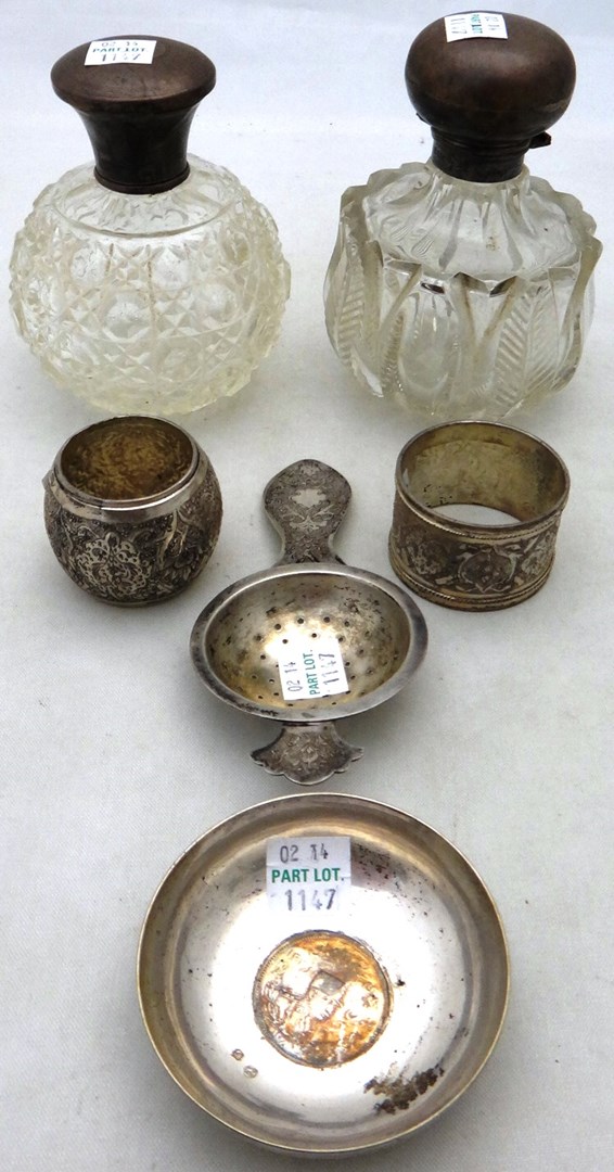 Appraisal: Two silver topped faceted glass scent bottles and Iranian wares