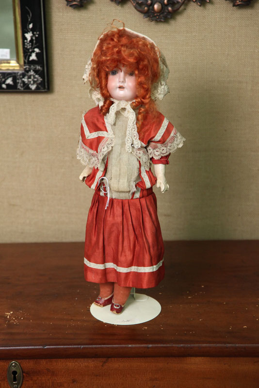 Appraisal: BISQUE HEAD DOLL Recknagel marked ''R A'' Composition body blue