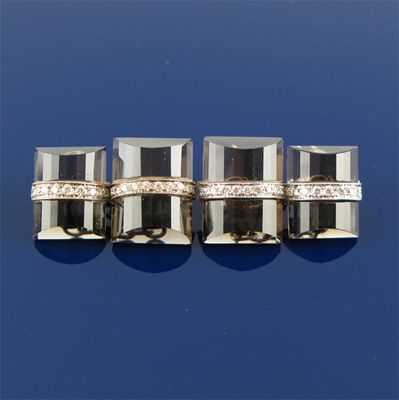 Appraisal: A pair of dress cufflinks The fluted rectangular smokey quartz