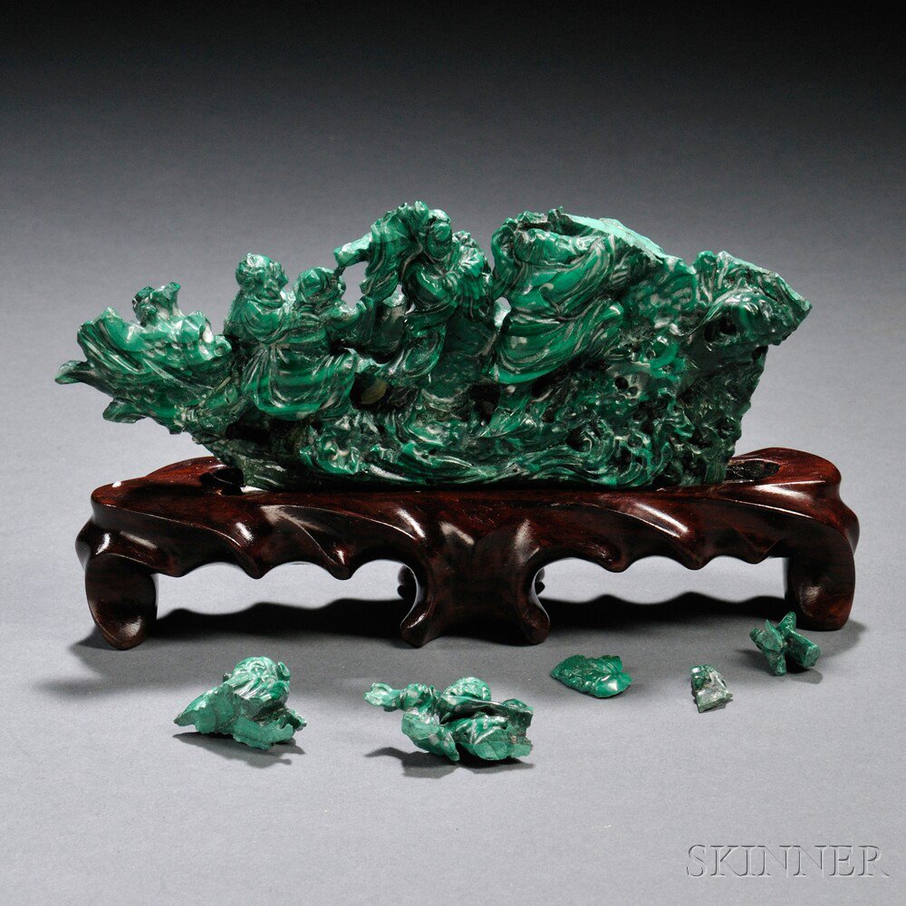 Appraisal: Malachite Carving with Wood Stand depicting the eight Daoist Immortals