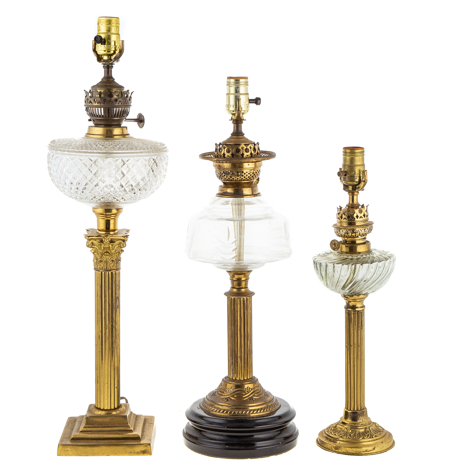 Appraisal: THREE AMERICAN BRASS GLASS ELECTRIFIED OIL LAMPS Late th century