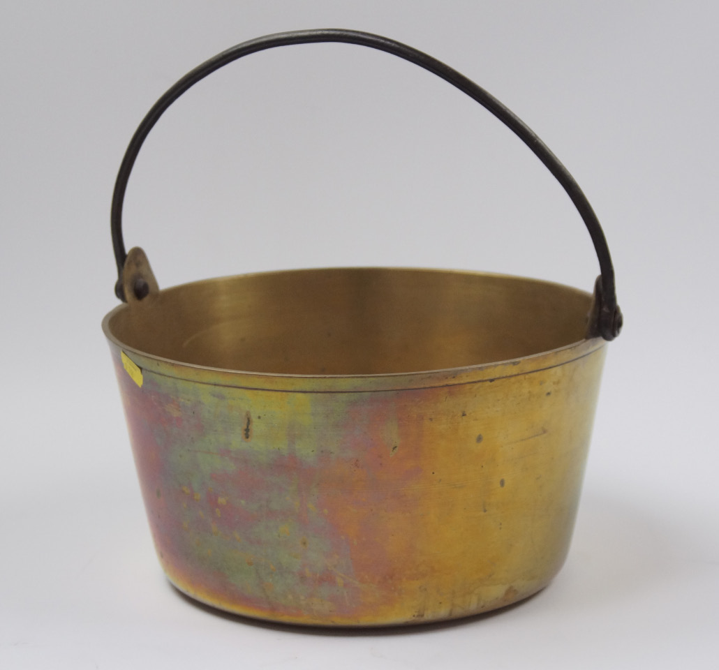 Appraisal: A brass muslin pan with iron swing handle cm diameter