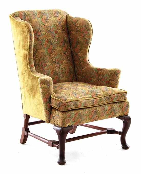 Appraisal: George III mahogany upholstered wingback armchair last quarter th century