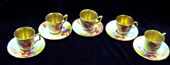 Appraisal: A part set of five cups and five saucers decorated