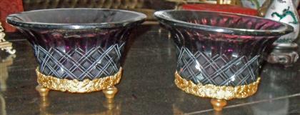 Appraisal: Pair of Bohemian purple flash glass and gilt metal mounted