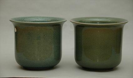 Appraisal: Pair of Celadon Crackle-Glazed Jardini res