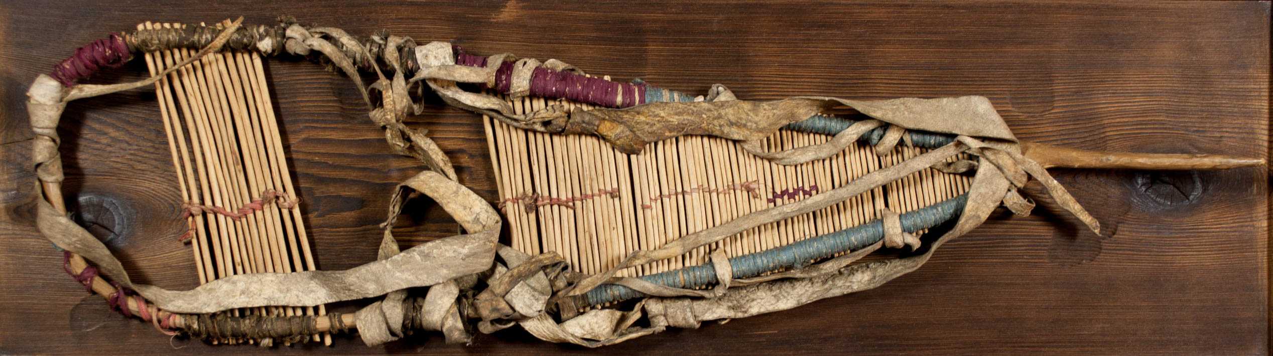 Appraisal: NORTHWEST NATIVE AMERICAN CRADLE in display case The cradle board