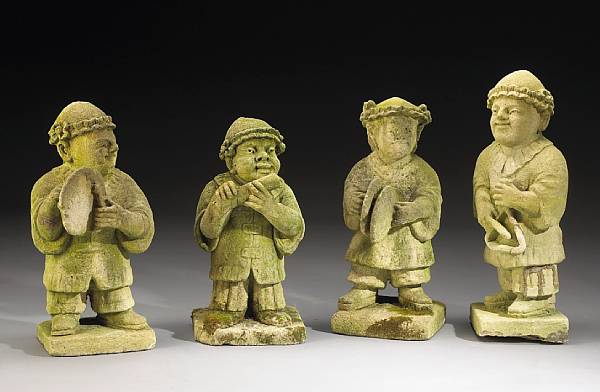 Appraisal: A set of four English cast stone garden musicians th