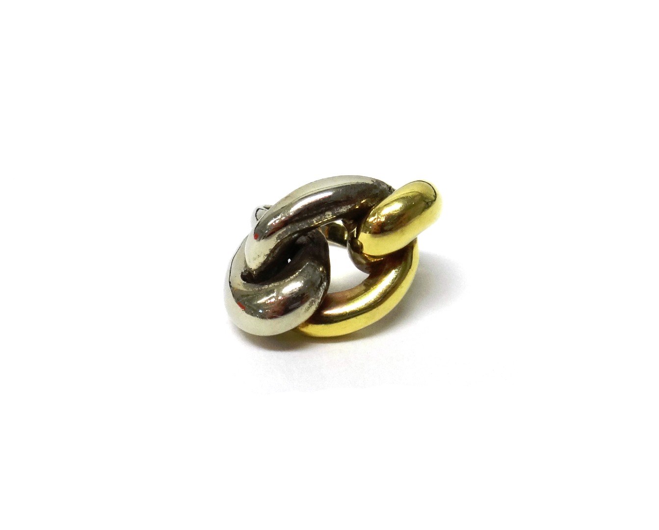 Appraisal: A two colour gold ring in an oval and twin