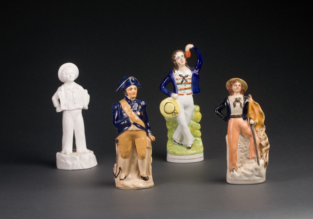 Appraisal: TWO STAFFORDSHIRE FIGURES A POTTERY FIGURE OF NELSON AND A