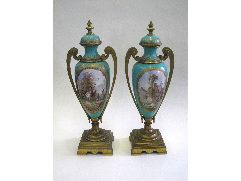 Appraisal: Pair of Sevres style ormolu mounted porcelain vases depicting men