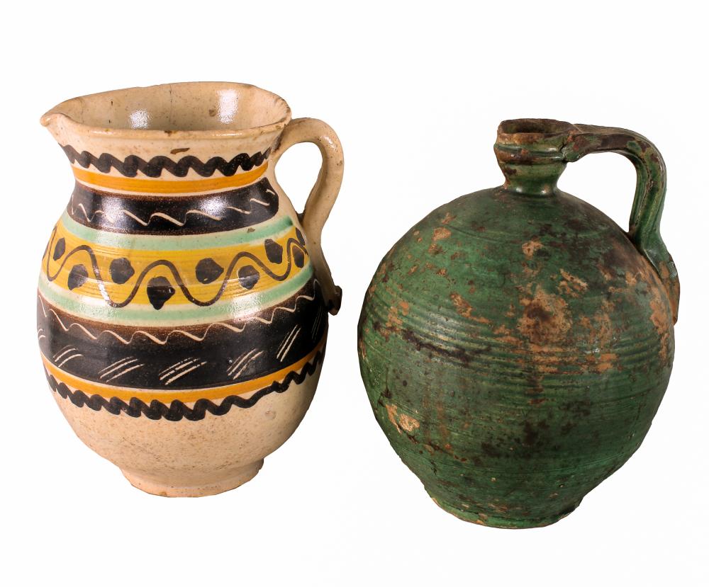 Appraisal: TWO CERAMIC JUGSunsigned Condition the green one has been fully