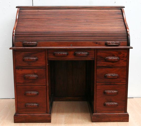 Appraisal: A mahogany roll-top desk cm wide cm deep cm high