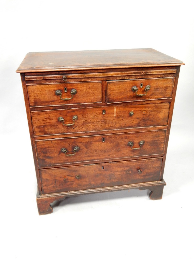 Appraisal: A George III mahogany gentleman's chest of two short and