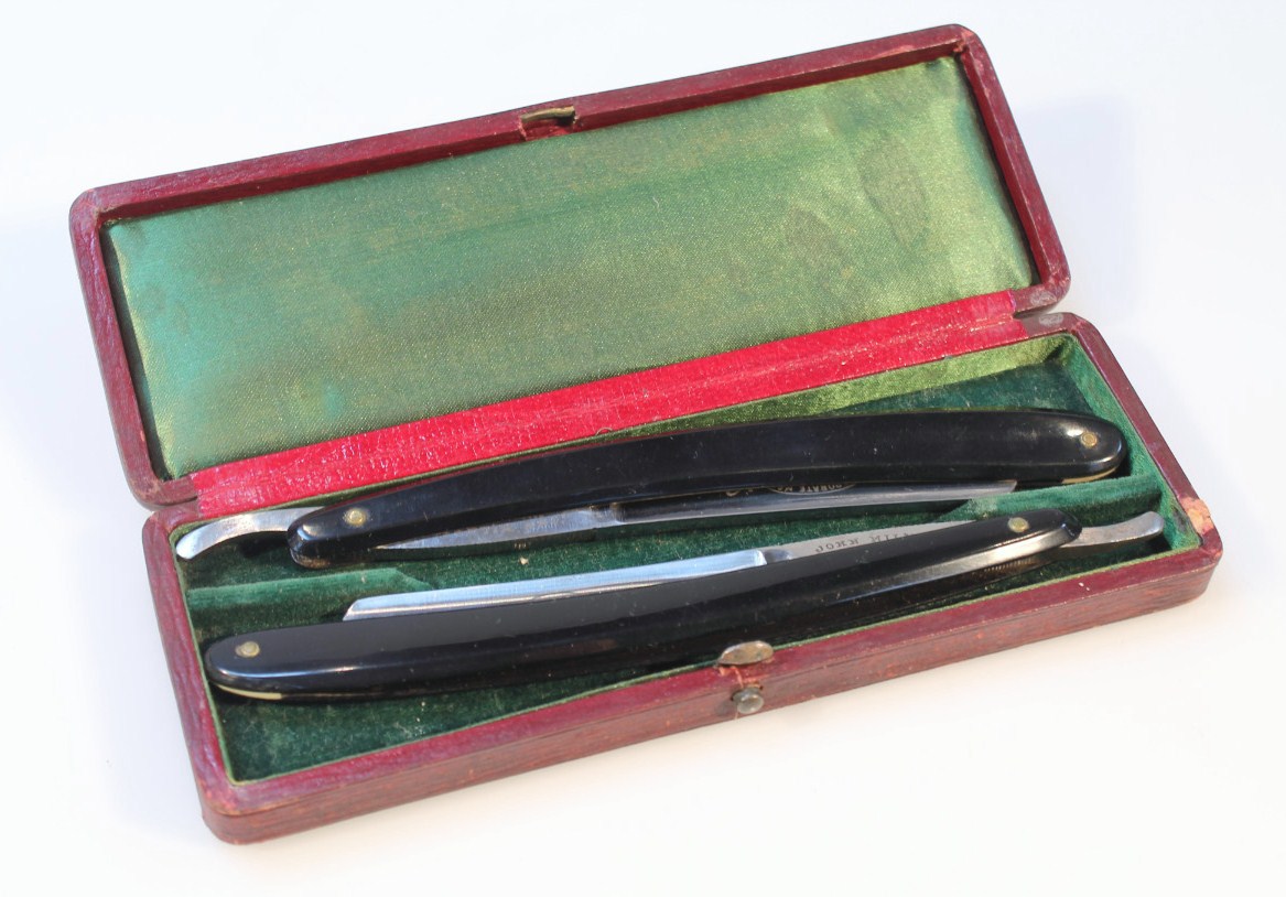 Appraisal: A pair of late Victorian Real Ring cut throat razors