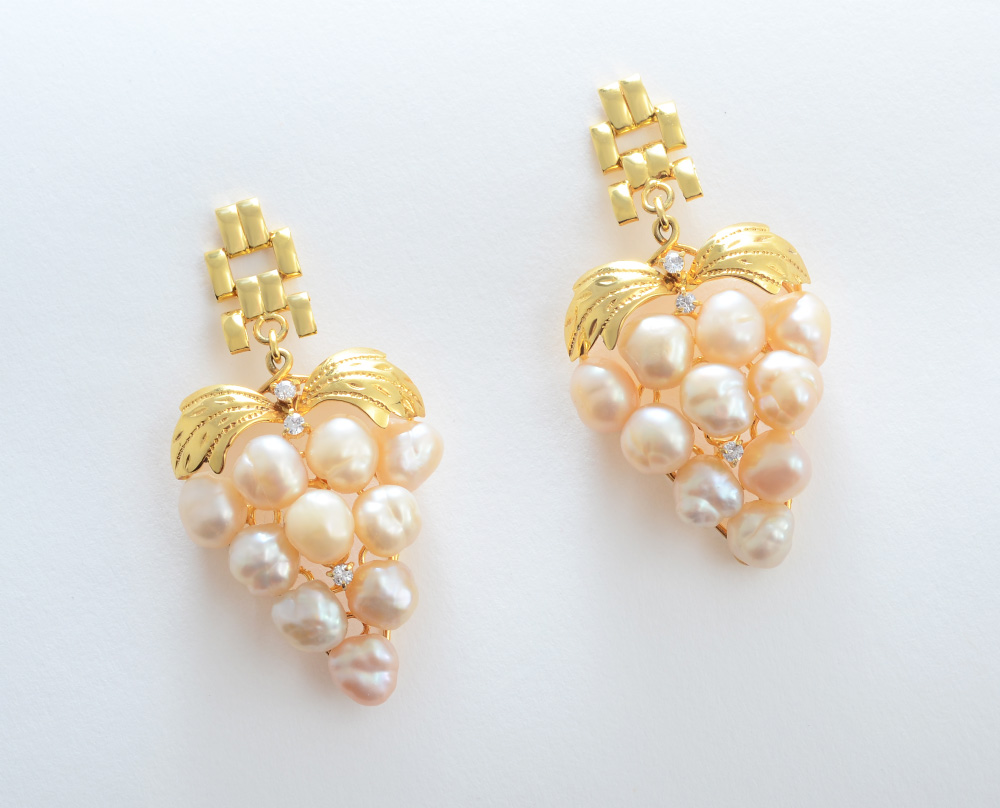 Appraisal: PEARL CLUSTER EARRINGS K yellow gold earrings with clusters of