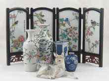 Appraisal: Ceramics A miniature four fold screen the ceramic panels decorated