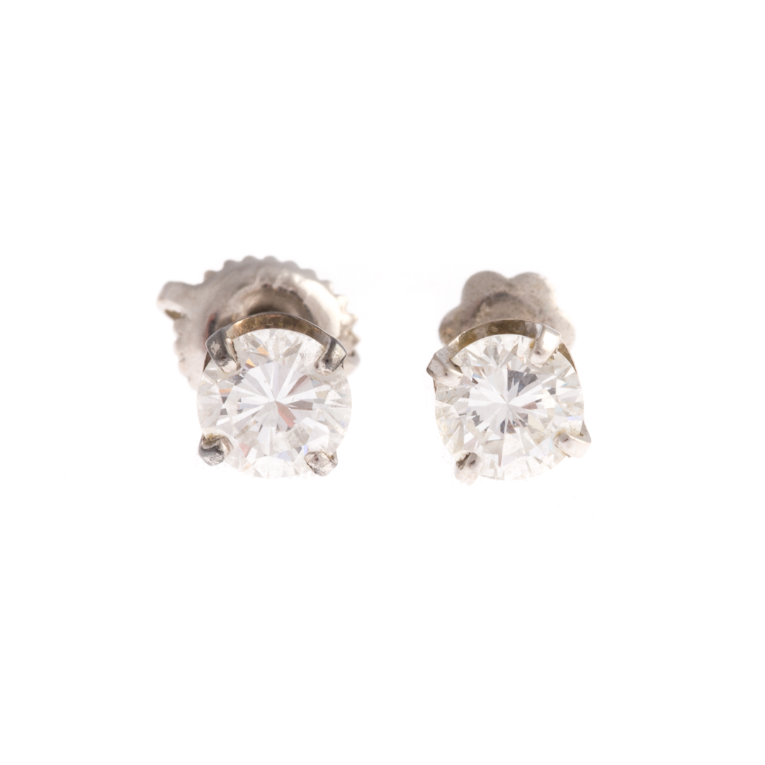 Appraisal: A Pair of White Gold Diamond Solitaire Earrings A pair