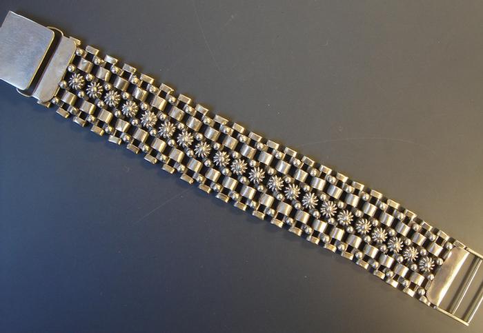 Appraisal: Sterling Bracelet Mesh link with center line of flowers mm