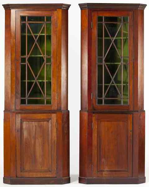 Appraisal: Pair of Diminutive English Corner Cupboardslate th century mahogany and